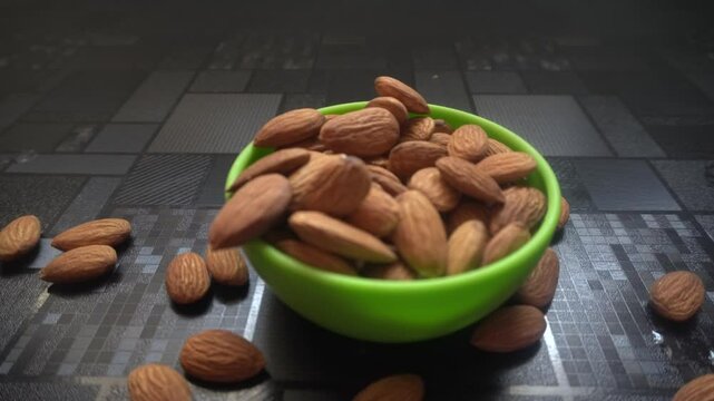 Almonds are nutrient-rich, oval-shaped dry fruits with a crunchy texture, high in healthy fats, protein, vitamins, and antioxidants, promoting heart health, brain function, and overall wellness