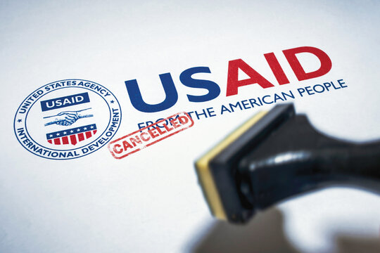 Bangkok, Thailand - February 19 2025: USAID (United States Agency for International Development) logo on paper. Order to suspend aids and cut funding.