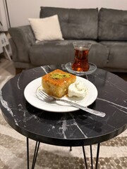 Ramadan dessert revani with turkish traditional tea at local home