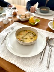 Homemade Creamy fish chowder soup in bowl
