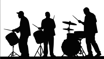 Silhouetted drummers performing on stage