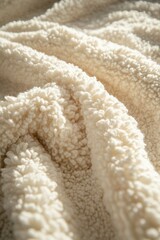 Soft boucle fabric featuring textured cream surface for cozy ambiance