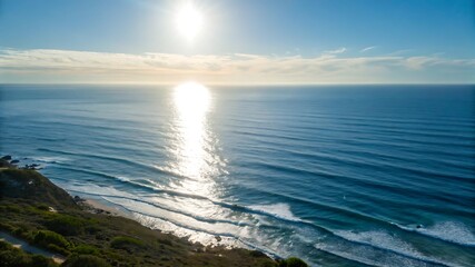 Obraz premium Tranquil Ocean Horizon with Sun Reflection on Calm Blue Waters – Peaceful Seascape for Relaxation and Travel Inspiration