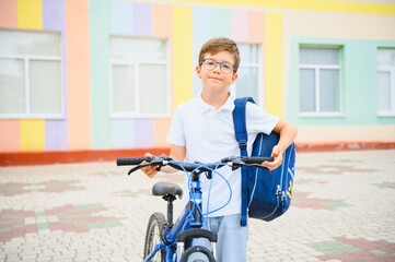 Child Riding Bicycle from School