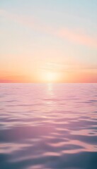 Obraz premium Peaceful ocean scene during a beautiful colorful sunset