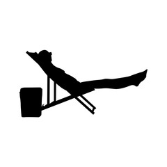 A beachside lounge setting with palm trees  