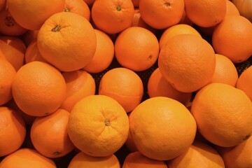 a pile of fresh oranges fruit