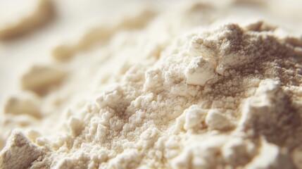 Fine collagen powder captured in a macro shot highlighting its texture and color in a well-lit setting