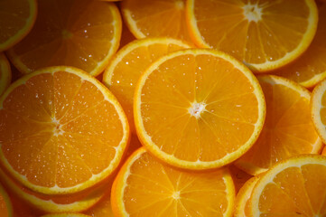 Freshly sliced oranges arranged in a vibrant and inviting display