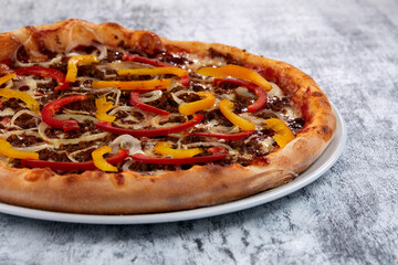 fresh pizza on the white plate