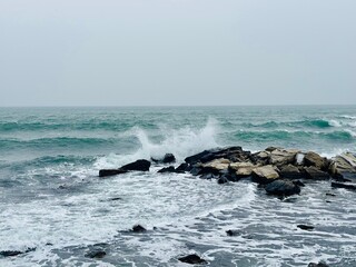 waves crashing on rocks