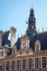 Famous building in the center of Paris the capital of France, City Hall with sculptures on the roof. Photography of architecture in Europe.