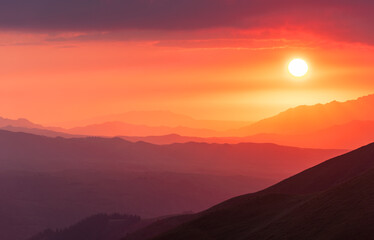 Picturesque landscape with sunrise in the mountains of the northern Tien Shan in southeast Kazakhstan on a summer morning