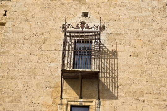  detail of the ducal palace of pastrana with the grille of the princess of eboli's room