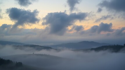 Fototapeta premium Misty Hills and Cloudy Sky at Sunrise Nature Landscape View