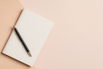 close-up of neat workspace with to-do list black pen and simple leather notebook