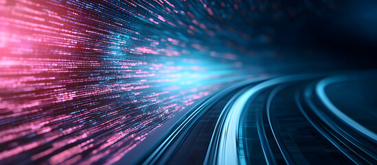 A train is traveling down a track with a bright blue and pink light trailing it