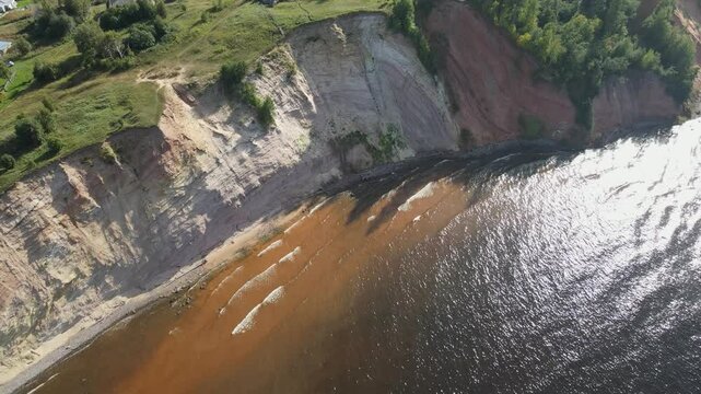 National Park nature Reserve in summer, canyon, large cliff stretching prima into the sky and water taken from a drone