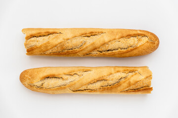 French baguette on a white background. macro shot of fresh bread, organic baked goods