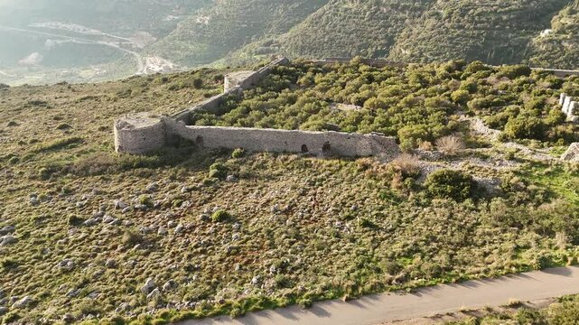 Aerial view of Kelefa Castle and its tower and walls during sunset, Mani, Laconia, Greece.