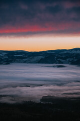 A Golden Farewell from the Sun as the Frozen Landscape Succumbs to the Encroaching Twilight