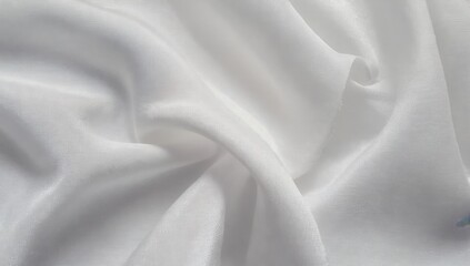 Obraz premium Classic white satin fabric with soft, elegant drapery, offering a timeless and luxurious feel. Ideal for formal wear, weddings, and premium branding