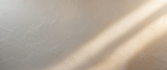 Venetian plaster textured surface with light gradient creating depth for a bright banner