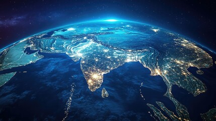 A Stunning Nighttime View of India from Space: Illuminated Cities on the Globe Surrounded by the Blue Sphere
