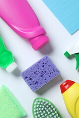Many different house cleaning products on white background