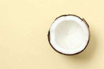 Coconut on color background, top view