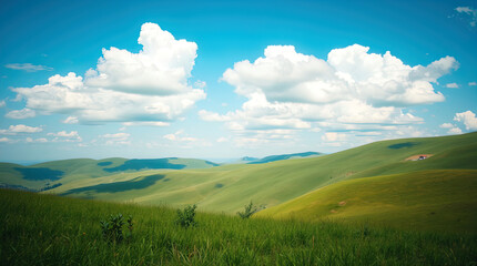 a picturesque landscape with rolling green hills under a bright blue sky dotted with fluffy white clouds.