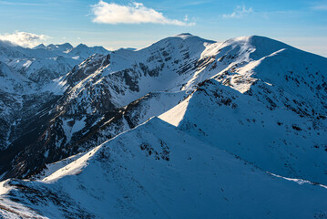 line of peaks in the Tatra Mountains leading to the sky