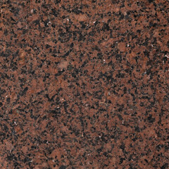 Beautiful Close-up of Red Granite Stone with Rich Texture and Natural Patterns