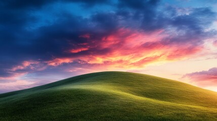 Obraz premium Serene Rolling Hills Under Colorful Dramatic Sunset Sky