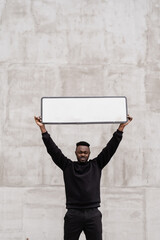 Making difference in society with social activism and empowerment. African activist is holding a...