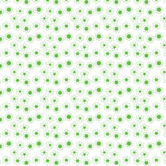 The background is bright green, stylized flowers, similar to daisies, with a round center and symmetrical petals, curved.