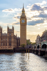Fototapeta premium Houses of Parliament with Big Ben tower and Westminster bridge at sunset, London, UK