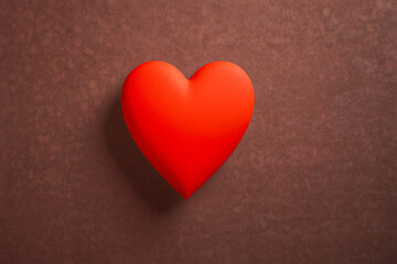 Valentines day concept, red heart and wooden background