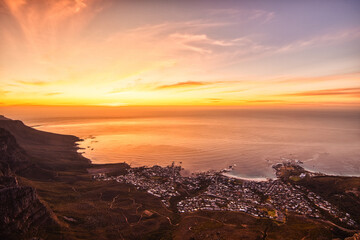 Cape Town Sunset Aerial View from Table Mountain over Camps Bay, Lion's Head and Twelve Apostles in the Background