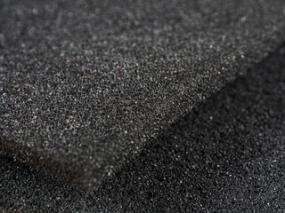 Polyurethane foam material for noise insulation and packaging, efficient and lightweight, ideal for sound protection.