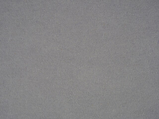 A textured, off-white watercolor paper background. Subtle variations in tone create a soft, artistic surface.
