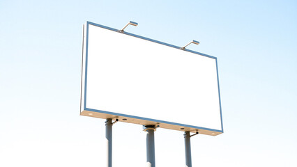 Obraz premium blank white billboard under a clear blue sky
