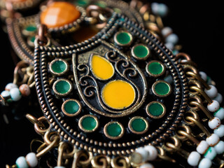 Abstract Jewelry Decorations in Macro Photography: Detailed elements that play with shapes and colors, perfect for art and design.