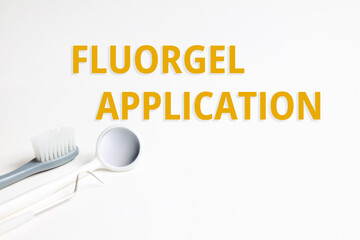 Fluorgel application inscription title on hygienic dental background