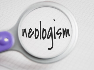 Neologism title text through a magnifying glass on a notepad background