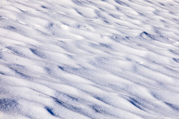 View of natural snow texture in winter in mountains.
