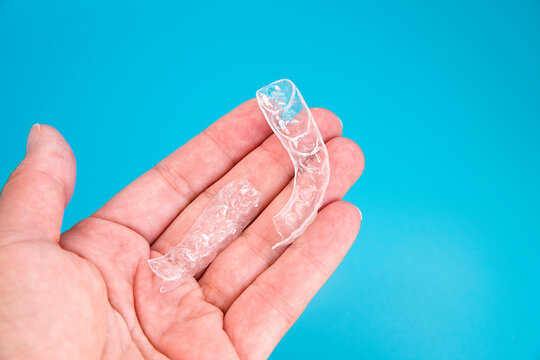 Hand-held, transparent, broken denture corrector treatment