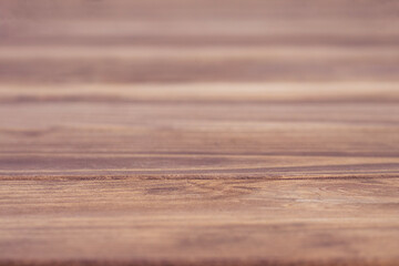 Fototapeta premium Close-up of a natural wood surface with visible grains and texture