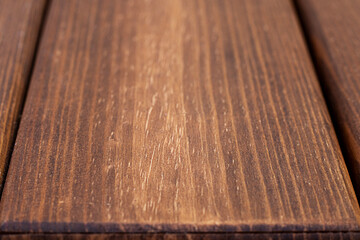 Close-up view of polished wooden surface with detailed grain texture