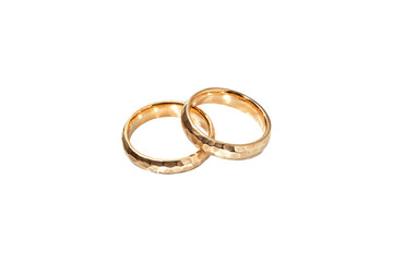 Two Gold Hammered Wedding Rings on Black Background,